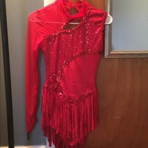 Red dance costume with one sleeve and fringe